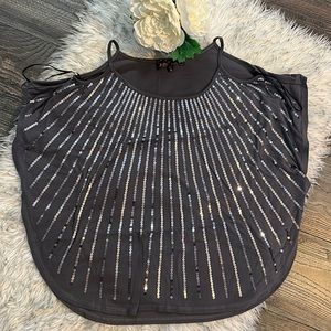 Woman’s gray blouse